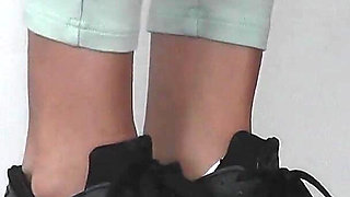 While Nomi Is on the Phone, the Slave Has an Orgasm