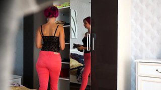 Watch this teen undress and try clothes