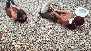 Crook Girls Tied Tight. Two Powerless Cowgirls Cleave Gagged to a Tree and Rough Ropes Hogtie