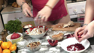 Two women. Adult mature MILF and teen virgin girl in red erotic lingerie without panties kiss on lips in kitchen. Old and young