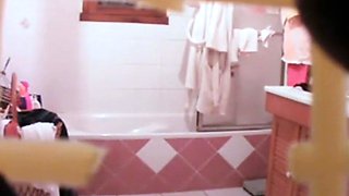 Skinny stepmom washing pussy in bathroom