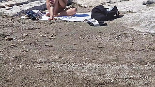 on the beach I'm hiding, looking at a woman sunbathing, close-up of her pussy and tits