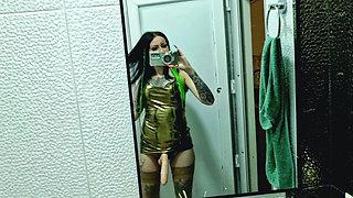 A slave is cleaning a dirty toilet when Dominatrix Nika comes to him with a strap-on and makes him take the strap-on in his mout