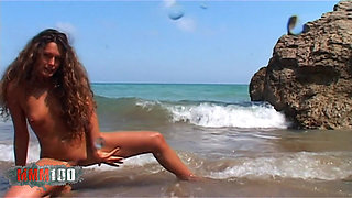 Vayana Sexy Brunette Vayana Stripping at the Beach