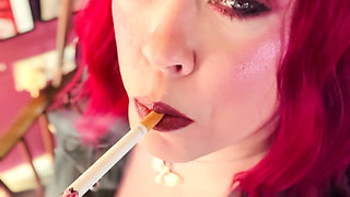 Your Mistress Tina Snua Dressed in Leather Chain Smoking 2 Cork Cigarettes
