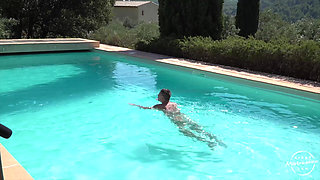 Red Strapon Sucking at the Pool