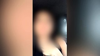 Slutty amateur flashing her big boobs in the backseat