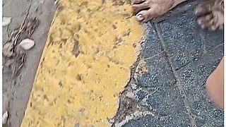 Dirty Feet Walk On The Beach And Show Themselves On The Street