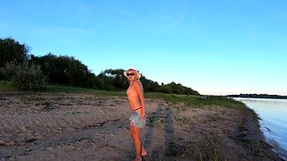 Russian Nudist on the River Shore