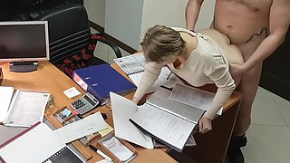 Hot office secretary sucks and rides her boss on the desk