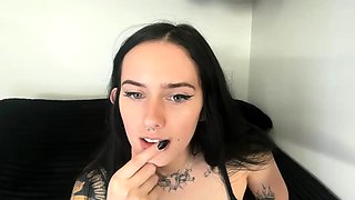 Busty babe playing with her big boobs