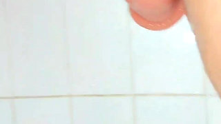Big Dildo in Shower Streches Tiny Pussy