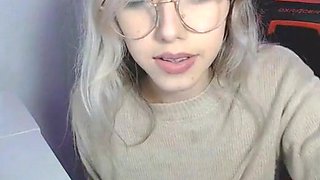 Petite Chick with glasses masturbates