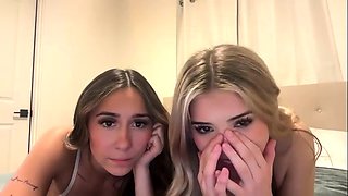 Blonde and brunette lesbians stripping and making out