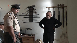 Pretty Blonde Girl Is Chained to the Ground to Be Tormented by Three Men