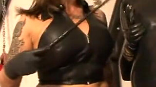 Humiliating bondage whipping in latex dress
