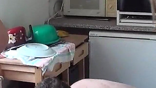 Young ladies playing with their slave in the kitchen