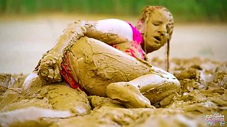 German teen masturbates to orgasm in muddy lake - wet and messy solo fingering