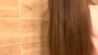 She is playing with pussy and fingering ass in shower