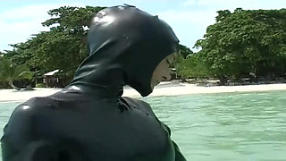 Girls in latex on the beach