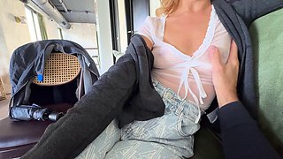 MrsMrJones sips coffee from a clear shirt flaunting pierced nipples in a bustling public cafe as