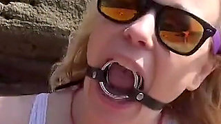 Gagged on the Beach Dripping and Drooling Down My Swimsuit
