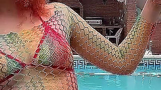 Having Fun with Bubble Maker Nearby Pool