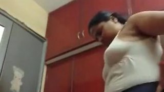 Indian BBW changes her clothes in front of a camera