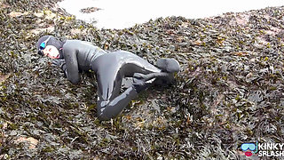 Rubbery Beach Encounter: Lucy's Neoprene Pussy Play with Stranger