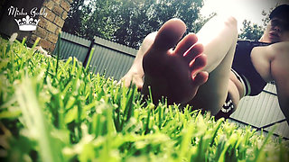Outdoor foot fetish dangle