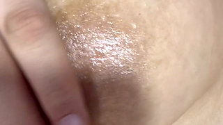 Mom oils herself very delicious and massages her tits