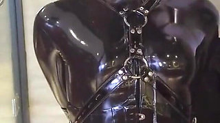 Mz20 - the Girl in Latex Clothing Locked in a Glass Room