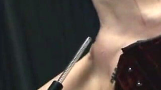 Dominating wax and dildo play
