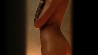Girl playing with wax in the shower
