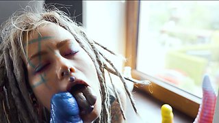 Gorgeous tattooed girl fucks her ass with a big dildo
