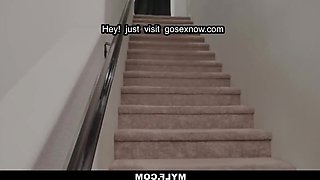 The submissive older woman, Rocky Emerson, is subjected to domination while clad in latex attire and towering high boots.