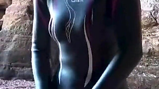 Shiny Rubber Wetsuit Tease in Private Cave