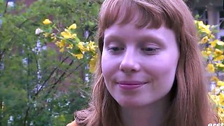 Sexy redhead stunner uses a yam-sized faux-cock for solo
