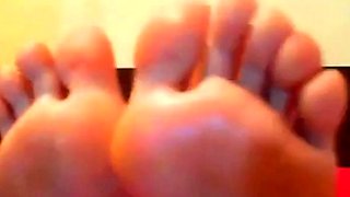 Blonde Licks Her Feet on Webcam