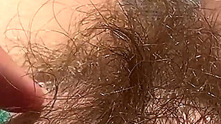 Amateur Hairy Girl Mastubates in Closeup with Huge Clit