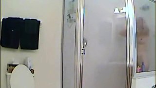 MILF stepmother spied in the shower