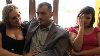 Young brunette involved by a mature woman in a hard threesome