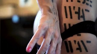 MILF seductress with big boobs peels off her sexy lingerie