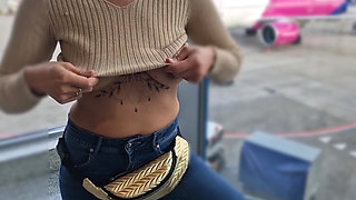 Flashing Her Tits in at the Airport, Showing Her Tits to Everyone