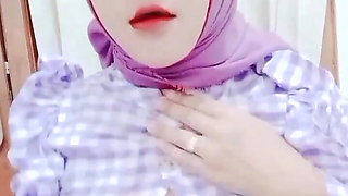 Kuala Lumpur Woman's Viral Purple Hijab Squeezes Her Breasts and Masturbates