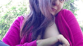 Nicoletta Smokes in a Garden and Shows You Her Big Tits by Pulling Them Out of Her Shirt