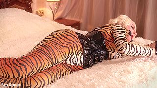 Submissive MILF gagged and bondage taped in spandex catsuit