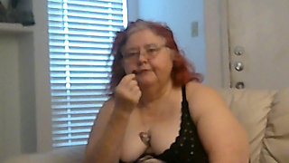 Mature BBW Redhead Nurse Vicki Talks to You as She Makes a Lipstick Applying Video for You!