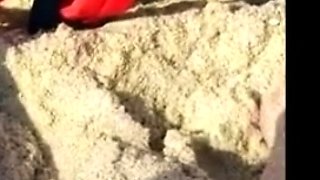 Big-Breasted Girl's Orgasm at the Beach