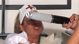Mature Nurse Spreads Wide for Intense Toy Play While Sucking